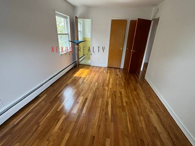 Building Photo - 22-53-53 76th St