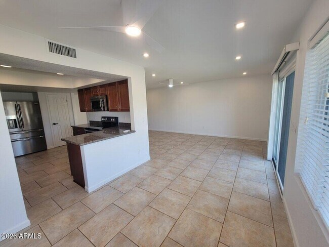 Building Photo - 4428 E Joan De Arc Ave