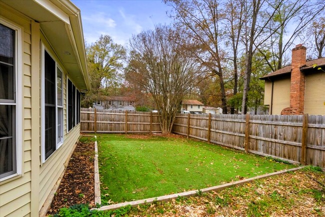 Turf area in the backyard, with mini-golf. - 34 Shenandoah Dr