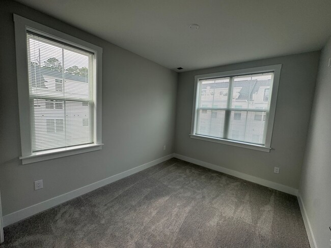 Building Photo - BRAND NEW - 3 Bed | 2.5 Bath End Unit Town...