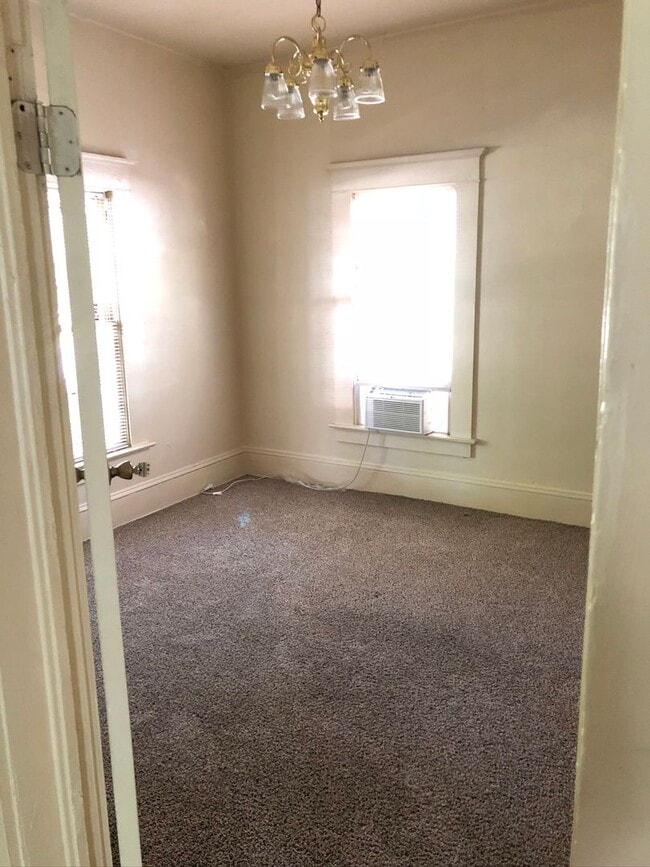 Building Photo - Adorable 7 bedroom house directly across from Chico State! Available July!