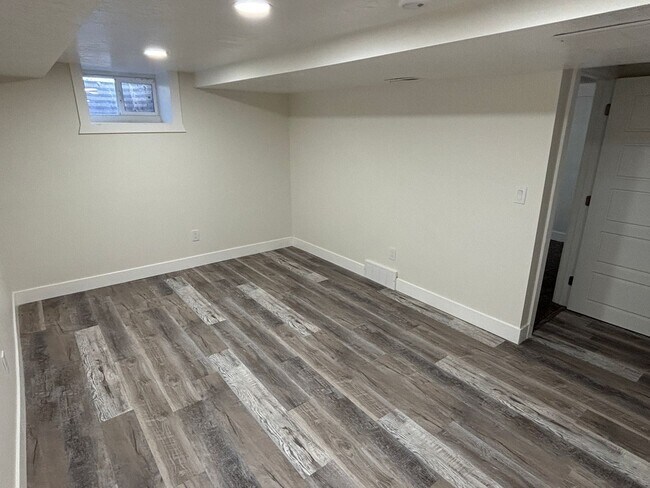 Building Photo - Beautifully Renovated 4-Bedroom Home with Finished Basement