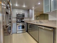 Building Photo - A Beautiful updated trilevel townhome in W Figueroa is now available for rent.