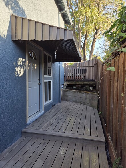 Private entrance. New deck. Door threshold and trim being replaced. - 2753 Sulphur Dr