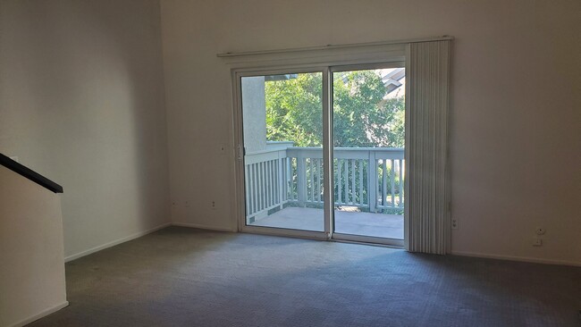 livingroom and balcony view - 7131 Farralone Ave