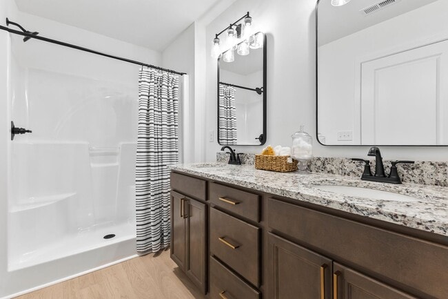 Building Photo - ONE-MONTH FREE RENT! Modern 3-Bed, 2.5-Bath Townhome – The Lily at Chapman Trace