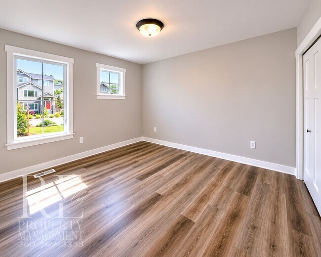 Building Photo - Luxury Poulsbo Retreat with Water Views, Covered Deck & Designer Finishes