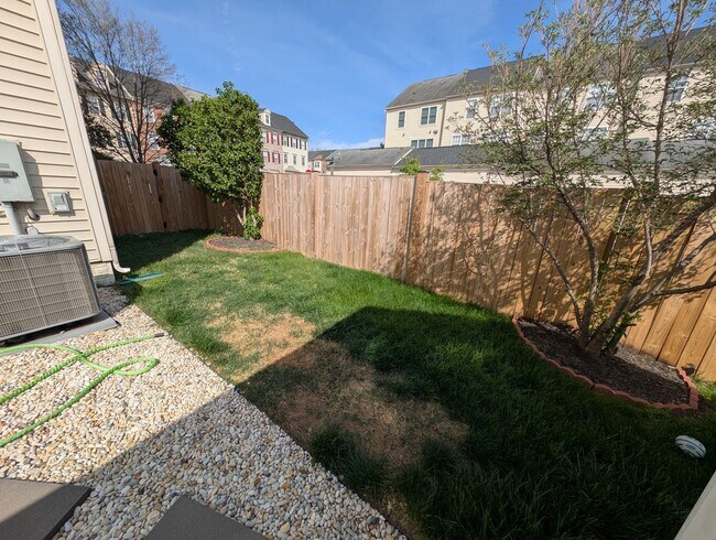 Building Photo - END UNIT STUNNER!