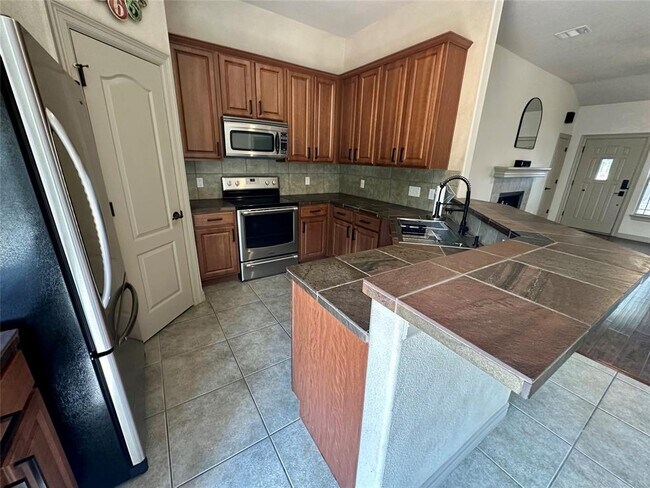 Building Photo - 15105 Cavalier Canyon Dr
