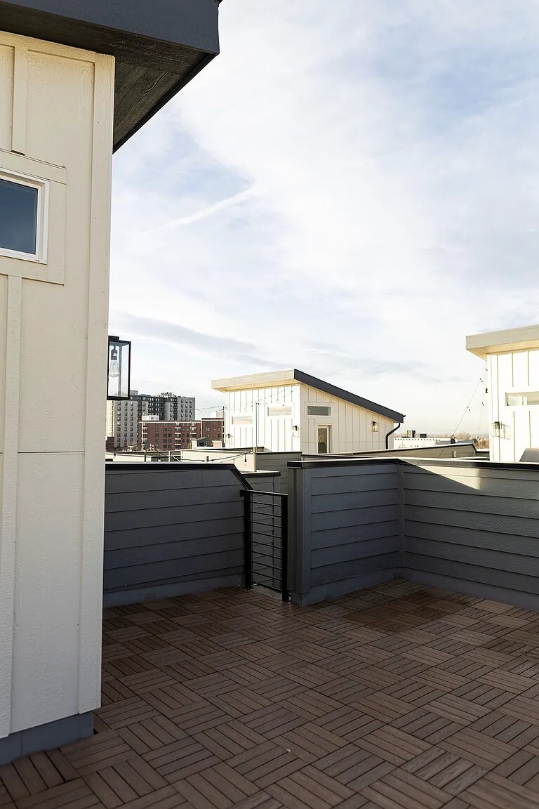 Private rooftop with a view of downtown, DU, mountains, and surrounding areas - 3505 S Marion St