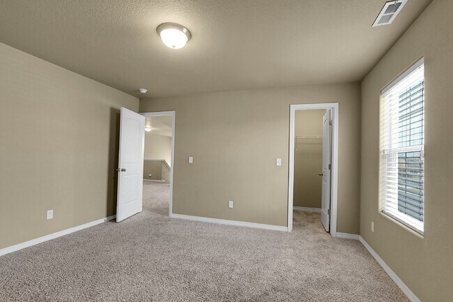 Building Photo - $2,490.95 - 4 Bed, 2.5 Bath Home in CO Springs with Fenced in Yard and 3 Car Garage!