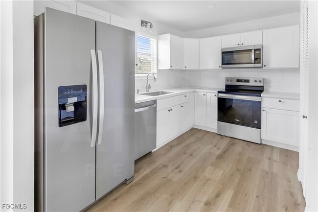 Building Photo - 10697 Holly Rd