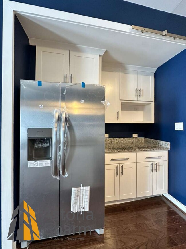 Building Photo - Beautifully Renovated 3BR Rowhome Near Johns Hopkins – Gated Parking + Modern Upgrades
