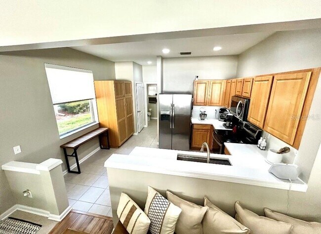 Building Photo - 8488 Sandy Beach St