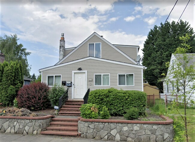 Building Photo - Character-Filled Concordia Home with Flexible Living Spaces & Gas Fireplace