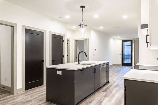 Building Photo - Modern Living Meets Walkable City Charm in...
