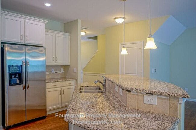 Building Photo - Charming End-Unit Townhome with Bonus Room, Screened Porch & 2-Car Garage – Convenient to RTP, RD...