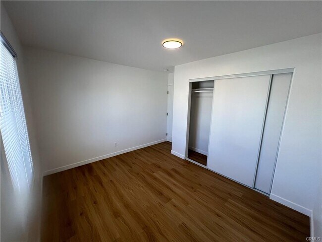 Building Photo - 8122 Belford Ave