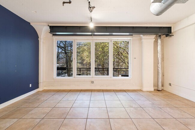 Building Photo - North Park Lofts - Historic Pearl District Warehouse Studio w/parking/most utilities/private balc...