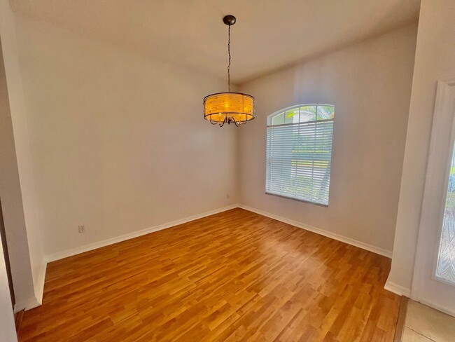 Building Photo - Spacious 4-Bed, 3-Bath Home in Guard-Gated...