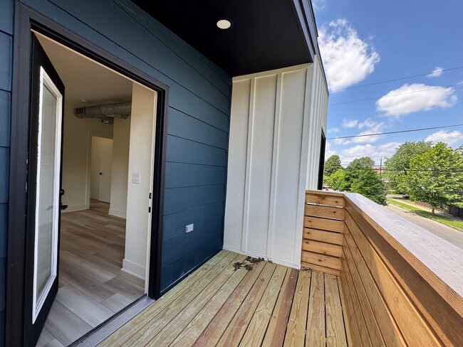 Building Photo - Vaulted Ceilings & Hardwood Floors in This Charming Indianapolis L