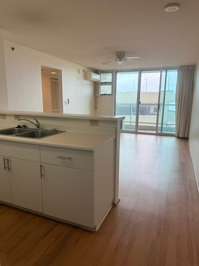 Building Photo - AC in Every Room. TWO Parking Stalls.