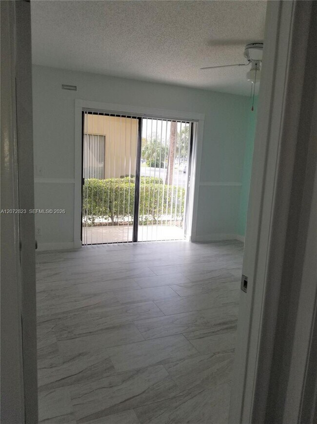 Building Photo - 11334 Royal Palm Blvd