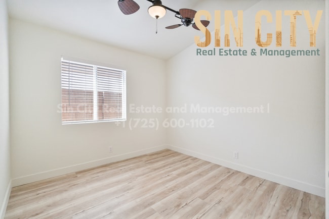 Building Photo - "Charming 3-Bed Oasis with Granite Touches & Cozy Fireplace in Las Vegas"