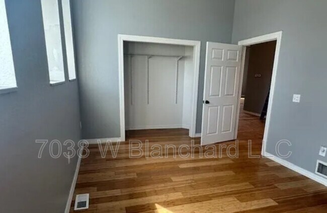 Building Photo - 7038 W Blanchard Rd