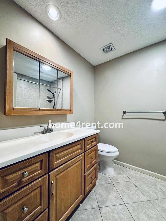 Building Photo - Beautiful, Split-Level Olathe Home w/ Stainless Steel Appliances and a Finished Basement!