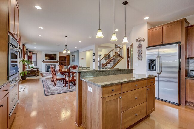 Building Photo - Grand 5 bed 4.5 bath Maple Grove Home w/ 3-Car Garage! Fully Furnished