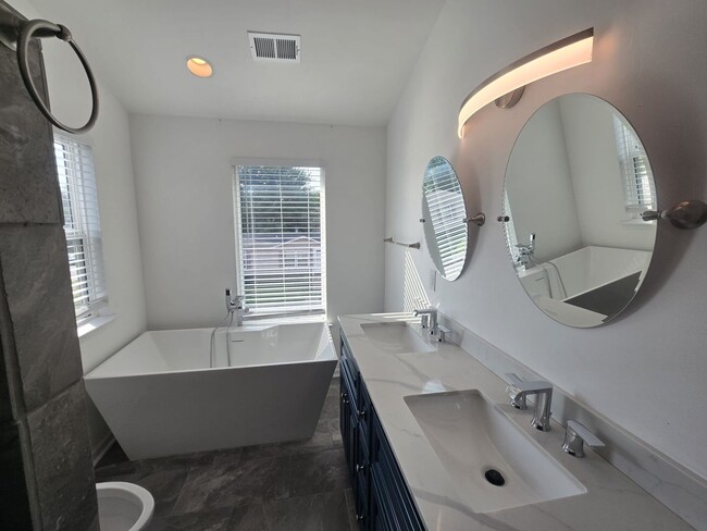 Building Photo - Welcome to The Buchanan Retreat – Modern 4...