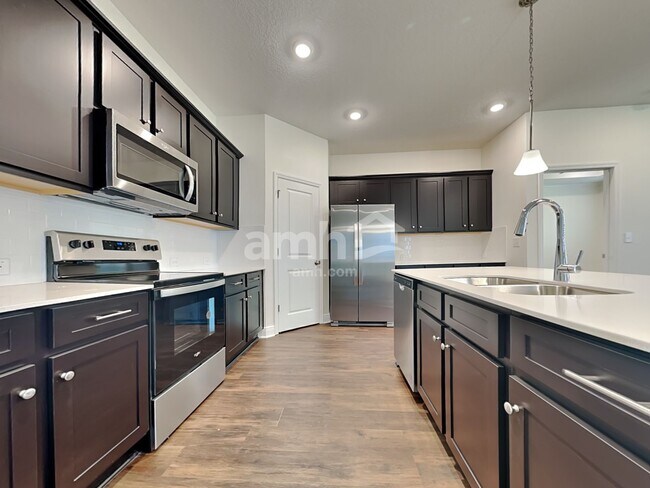 Building Photo - 6385 Emerald Hills Way