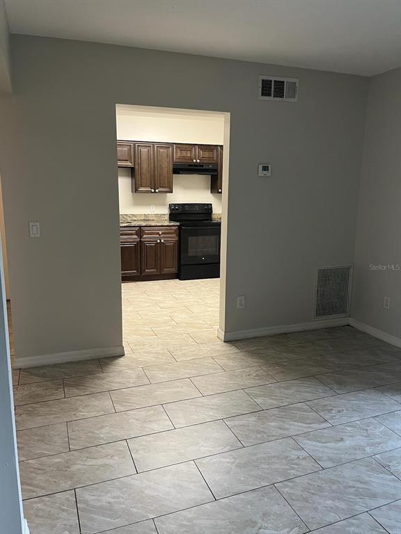 Building Photo - 5885 Dahlia Dr
