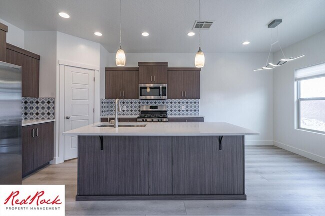 Building Photo - Comfort, Space & Style with a 3-Car Garage Small Dog Friendly!