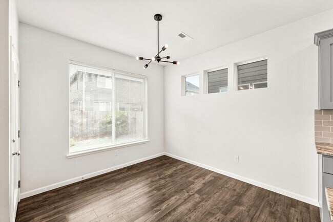 Building Photo - Spacious 4-Bedroom Home with Quartz Counters, Fully Fenced Yard & 2-Car Garage in Yelm!