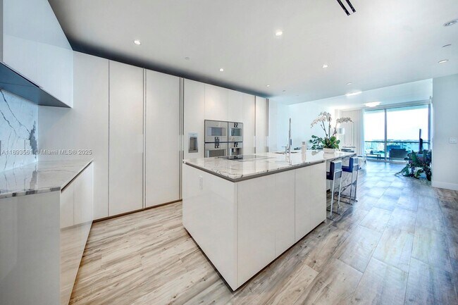 Building Photo - 10203 Collins Ave