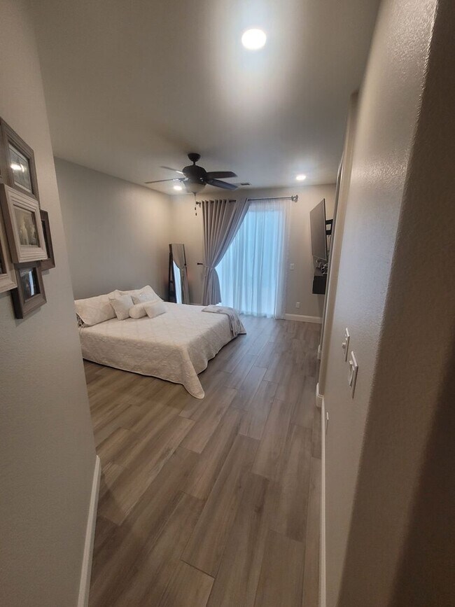 Building Photo - BEAUTIFUL - UPGRADED - LAMINATE FLOORING -...