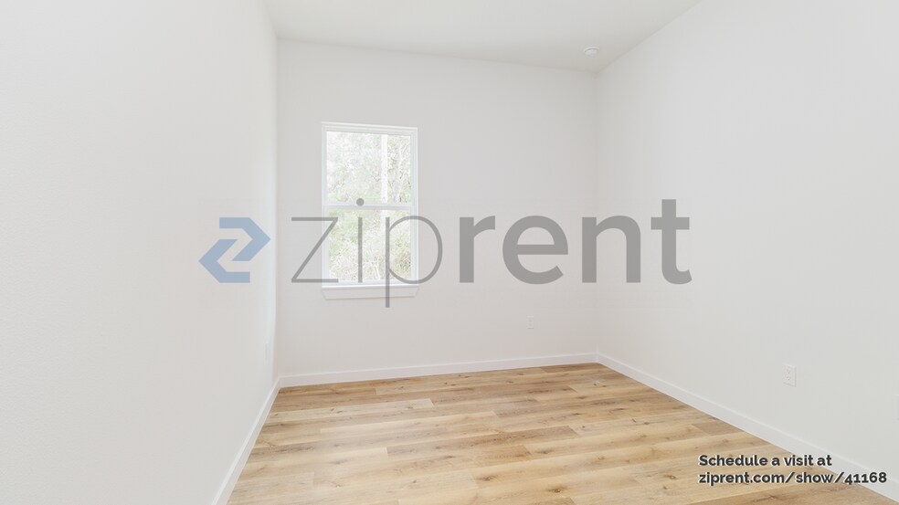 Building Photo - 8202 N Triana Dr