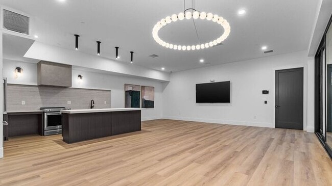 Building Photo - INVERNESS - BRAND NEW LUXURY ROW END THOUSE W 2 CAR GARAGE