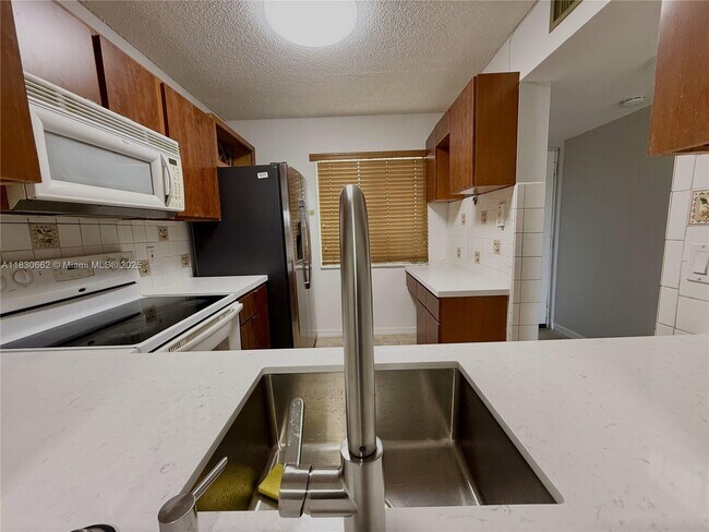 Building Photo - 8550 N Sherman Cir