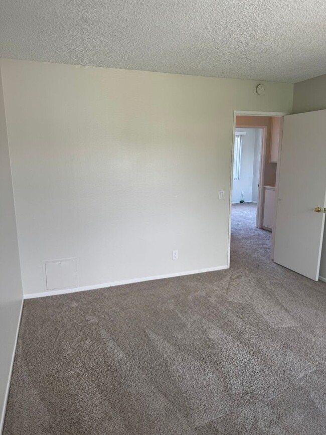Building Photo - COMING SOON! 3 Bed + 1.5 Bath Townhouse