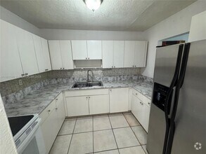 Building Photo - 1085 W 68th St