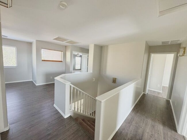 Building Photo - 4BR / 2.5BA Home with Expansive Lot – 2-Car Garage, Community Pools & Golf