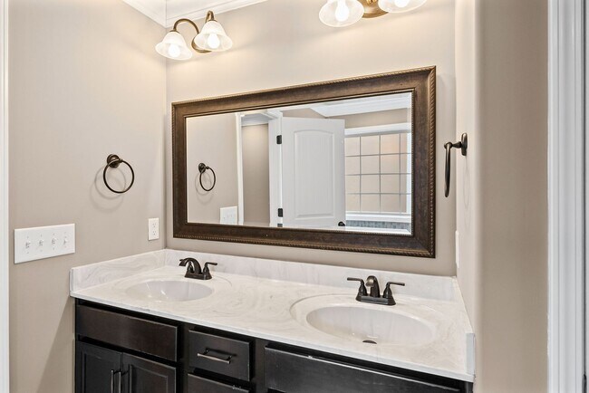 Building Photo - Four Bedroom with Three Car Garage!