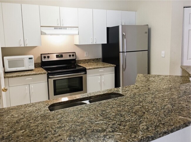 Building Photo - Upgraded 2/2 Condominium in Millenia at Mosaic