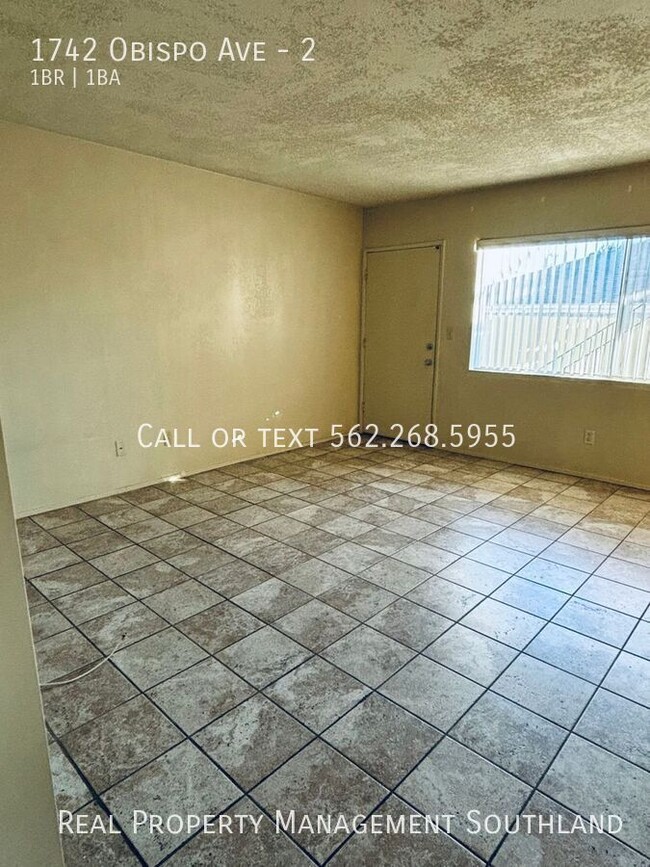 Building Photo - Spacious 1 BD + 1 Bath in gated building i...