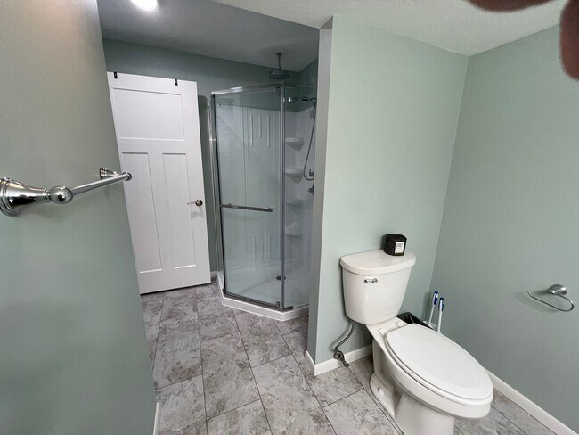 Glass surround shower with rainhead and separate hand held sprayer - 317 N Wasson Ln