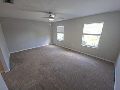 Building Photo - Spacious Townhome with Pond Views | 3BR + Loft + Screened Patio