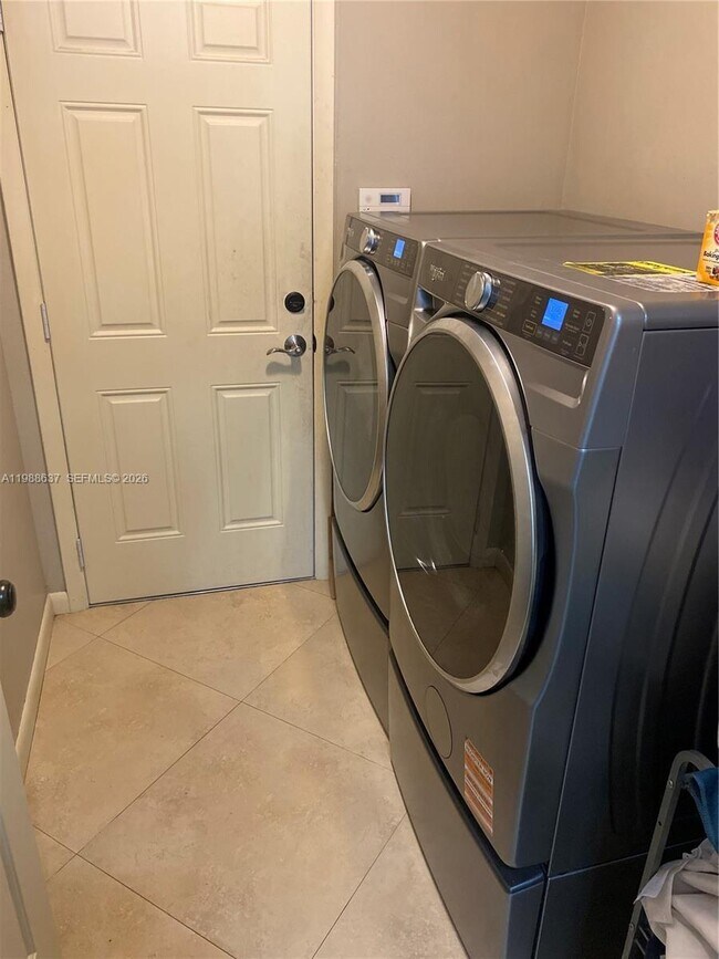 Building Photo - 10981 NW 7th St